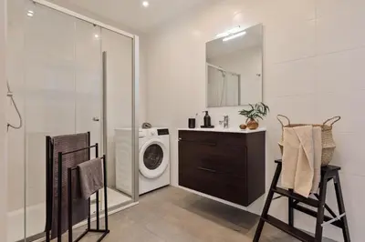 a bedroom with a bed with a wooden headboard at Isora - 1 bedroom in El Gòtic in Barcelona