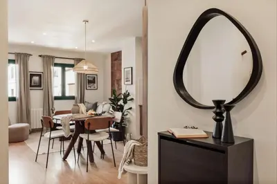 a bedroom with a large bed in a room at Isora - 1 bedroom in El Gòtic in Barcelona