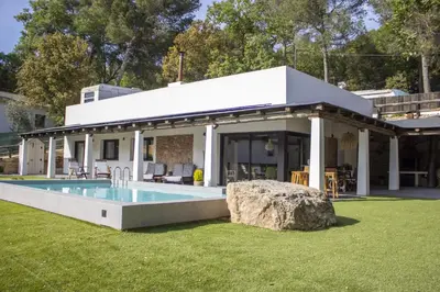 a house with a swimming pool in a yard at LAMAGADA - Casa en Montseny con Piscina Salada in Seva