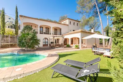 an estate with a swimming pool and a house at Charming Villa Tamarindo in Olivella