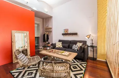 a living room with a couch and a table at Sweett - Loft Villa Olimpica Beach in Barcelona
