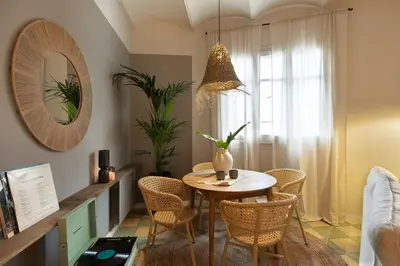 a bathroom with a shower and a toilet and a sink at Bawah - 2 bedrooms in Eixample Esquerra in Barcelona