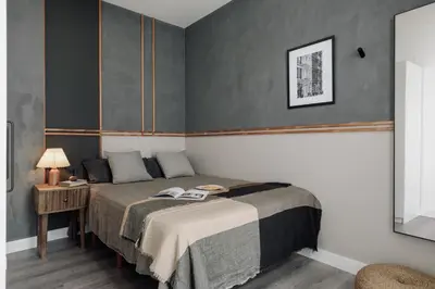 a living room with a couch and a large window at Punta - 3 bedrooms with pool in Les Corts in Barcelona