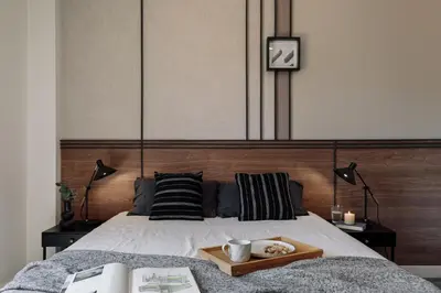 a bedroom with a bed and a table with a lamp at Punta - 3 bedrooms with pool in Les Corts in Barcelona