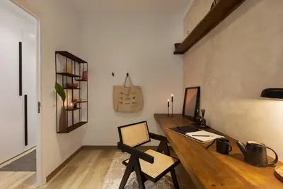 a hallway of a house with white walls and wooden floors at Afrera - 2 bedrooms and terrace in Sant Gervasi in Barcelona