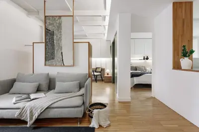 a kitchen with white cabinets and a stove top oven at Celoni - 1 bedroom and office in Sagrada Família in Barcelona