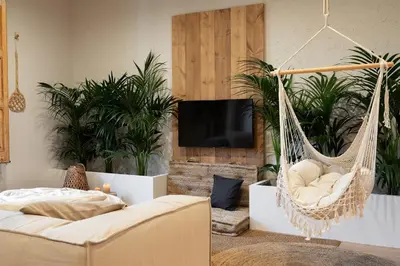 a living room with a couch and a table at Malay - 3 bedrooms in Eixample Dreta in Barcelona