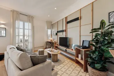 a kitchen with white cabinets and a sink at Karakoy - 2 bedrooms and balcony in Eixample Dreta in Barcelona