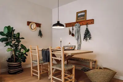 a white kitchen with white cabinets and a sink at Jaen - 2 bedrooms and office in Sant Gervasi in Barcelona