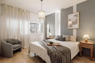 a bedroom with a bed with a tray on it at Iztapa - 4 bedrooms in Eixample Esquerra in Barcelona