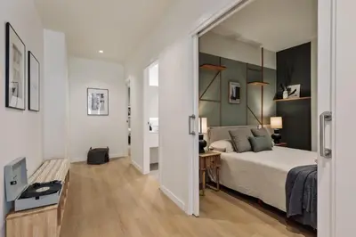 a dining room with a wooden table and chairs at Peten - 3 bedrooms, terrace and balcony in Gràcia in Barcelona