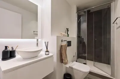 a bedroom with a large bed and a window at Peten - 3 bedrooms, terrace and balcony in Gràcia in Barcelona