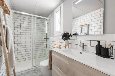 two chairs on a balcony with a ladder at Aura - 3 bedrooms and terrace in Sant Gervasi in Barcelona
