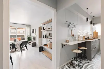 a room with a hallway with a table and a mirror at Aura - 3 bedrooms and terrace in Sant Gervasi in Barcelona