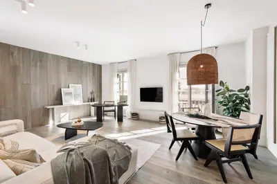 a bedroom with a bed and a large window at Fiore - 2 bedrooms in Ciutat Vella in Barcelona