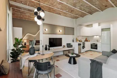 a kitchen with white cabinets and a dishwasher at Yaki - 2 bedrooms and balcony in Eixample Dreta in Barcelona