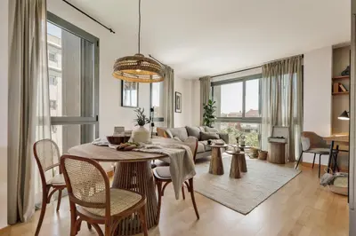 a bathroom with a toilet and a sink and a tub at Altos - 2 bedrooms in El Poblenou in Barcelona