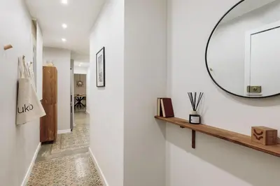 a dining room with a table and chairs at Poblet - 2 bedrooms and balcony in Poblenou in Barcelona