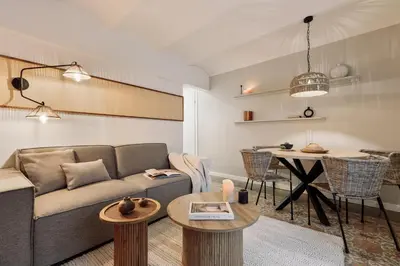 a white kitchen with a sink and a microwave at Poblet - 2 bedrooms and balcony in Poblenou in Barcelona