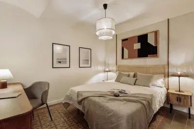a dining room with a table and chairs and a balcony at Poblet - 2 bedrooms and balcony in Poblenou in Barcelona