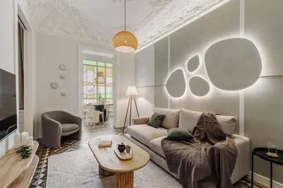 a bedroom with a bed and two lamps and a counter at Toliman - 1 bedroom and office in Eixample Dreta in Barcelona