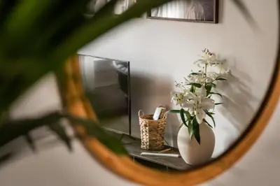a hallway with a living room with a table at Gili - 2 bedrooms and terrace in Eixample Dreta in Barcelona