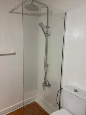 a shower in a bathroom with a toilet at Can Bosquet - Casa de invitados adosada a casa familiar in Corbera de Llobregat