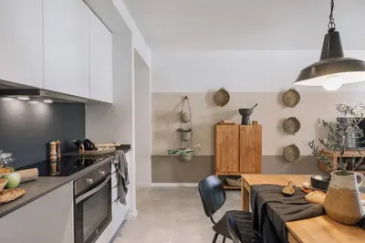 a bedroom with a bed with a mirror on the wall at Atalaya - 2 bedrooms in Eixample Esquerra in Barcelona