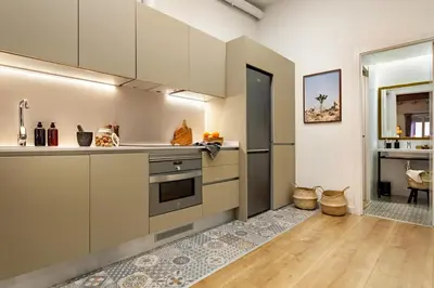 a living room with a couch and a table at Faya - 1 bedroom and balcony in Gràcia in Barcelona