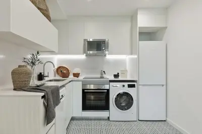 a living room with a couch and a table at Piano - 2 bedrooms and terrace in Ciutat Vella in Barcelona