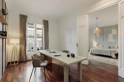 a room with a white table and two chairs at Priorat - 4 bedrooms and office in Sant Gervasi in Barcelona