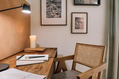 a room with a wooden rack with shoes at Algaba - 2 bedrooms in Eixample Esquerra in Barcelona