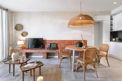 a living room with a couch and a table at Algaba - 2 bedrooms in Eixample Esquerra in Barcelona