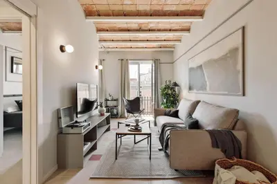 a dining room with a table and chairs at Rothko - 2 bedrooms and office in Eixample Dreta in Barcelona