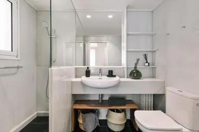 a hallway with a room with a bed and a window at Delfino - 4 bedrooms in Sant Gervasi in Barcelona