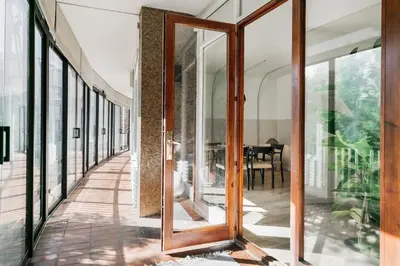 a living room with a couch and a tv at Delfino - 4 bedrooms in Sant Gervasi in Barcelona