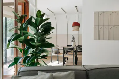 a bedroom with a large bed and a large window at Delfino - 4 bedrooms in Sant Gervasi in Barcelona