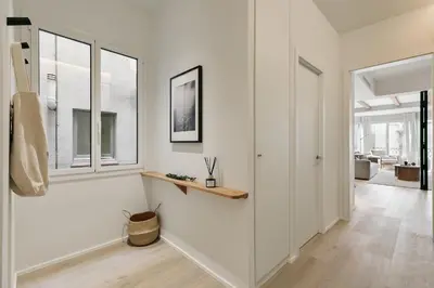a living room with a couch and a table at Grotta - 3 bedrooms in Sant Gervasi in Barcelona
