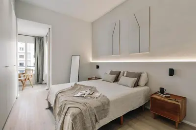 a dining room with a wooden table and chairs at Grotta - 3 bedrooms in Sant Gervasi in Barcelona