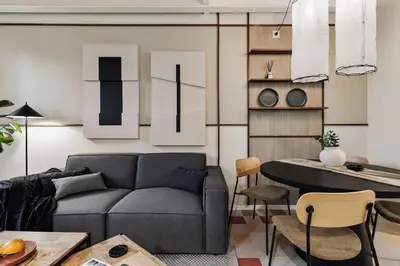 a living room with a couch and a tv at Andy - 2 bedrooms and office and balcony in Eixample Dreta in Barcelona