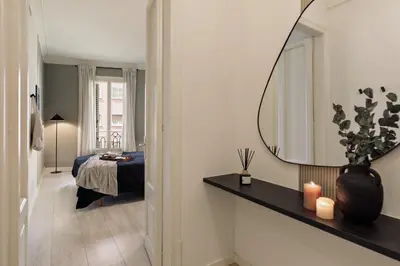 a kitchen with a table and a dining room at Warhol - 2 bedrooms and balcony in Sant Gervasy in Barcelona
