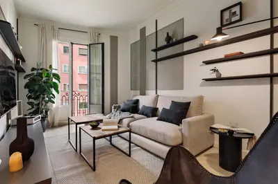 a living room with a couch and a table at Warhol - 2 bedrooms and balcony in Sant Gervasy in Barcelona