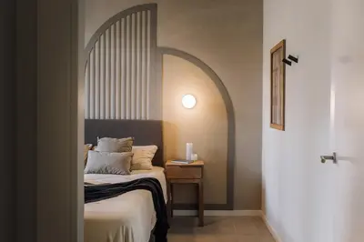a living room with a couch and a table at Senahu - 2 bedrooms and office in Eixample Dreta in Barcelona