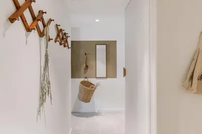 a bedroom with a large bed with a tray on it at Ohanes - 2 bedrooms in Eixample Esquerra in Barcelona
