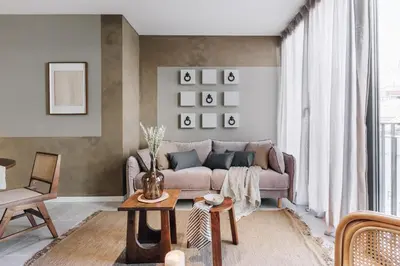 a living room with chairs and a dining room at Ohanes - 2 bedrooms in Eixample Esquerra in Barcelona