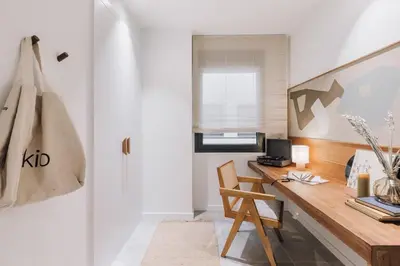 a bedroom with a large bed and a mirror at Ohanes - 2 bedrooms in Eixample Esquerra in Barcelona
