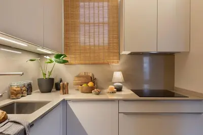 a living room with a couch and a table at Muari - 2 bedrooms in Eixample Esquerra in Barcelona