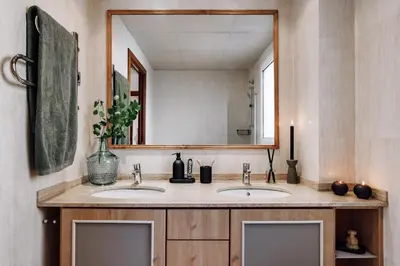 a living room with a table and a couch at Cazalla - 2 bedrooms and office in Gràcia in Barcelona