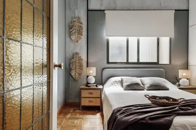 a living room with a couch and a table at Quemu - 2 bedrooms in Eixample Esquerra in Barcelona