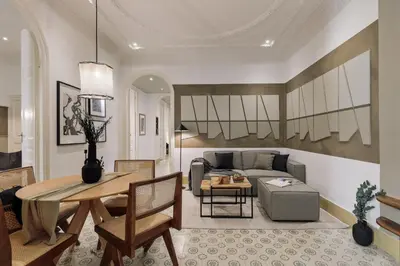 a bedroom with a bed with a book on it at Uru - 2 bedrooms and balcony in Vila de Gràcia in Barcelona